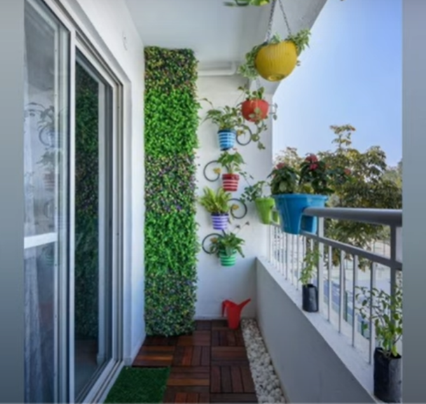 Green and functional balcony - your outdoor oasis in a 2 BHK home.